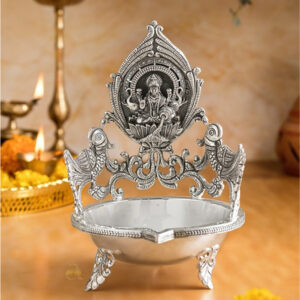 Peacocks and lakshmi diya crafted using silver